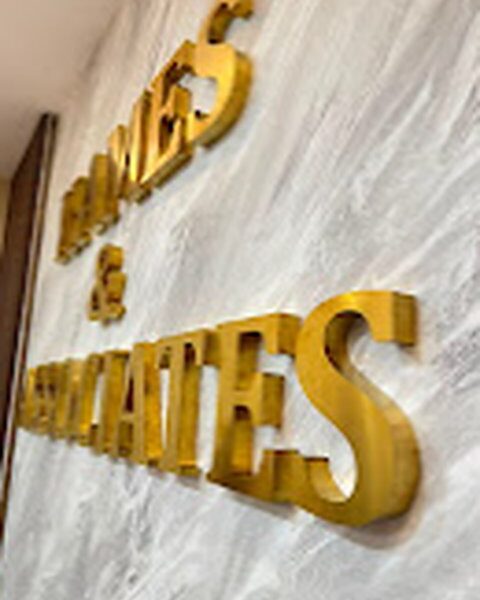 Gold 3D letters on a feature wall